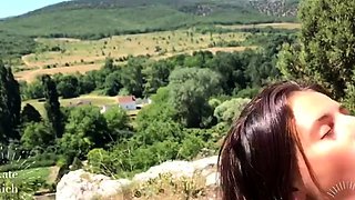 Amazing busty brunette slut doing blowjob outdoor