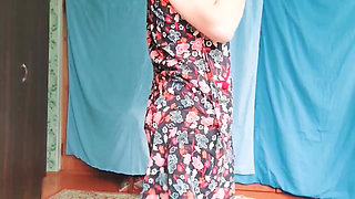 Playful trans girl showing thigh tattoo in short skirt