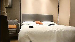 Cute amateur asian web cam girl playing with her toy