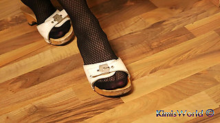 Retro Dangling in Patterned Nylons & Classic Wooden Mules