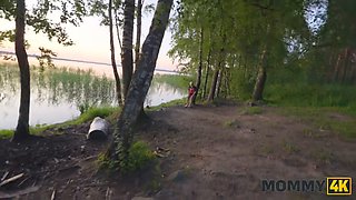 Malusha, the busty Russian cougar, seduces and fucks a guy with a huge cock in a park
