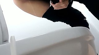 Sexy and sassy blonde chick got her pussy filmed in the toilet