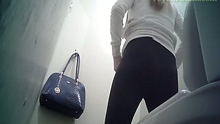 Cute white blonde teen in black panties filmed in the toilet