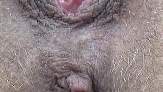 Extreme Close-up of Wet Hairy Vagina with Dildo