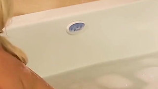 Blonde masseuse sucks and rides big cocks at the same time