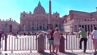 Alison Brie dancing in front of the Vatican