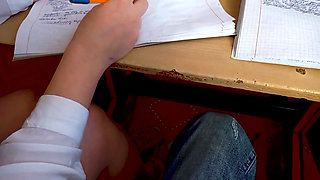 A classmate sucked a dick under a desk in a lesson