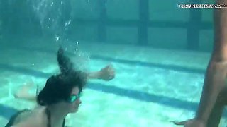 retro footage of two underwater lesbians