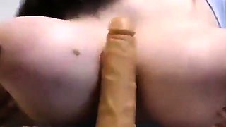 Big-Titted Brunette Amateur's Homemade POV Dildo Fun