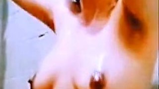 Sexy indian beauty stripping nude taking bath