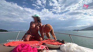 Glamour booty girls on the boat