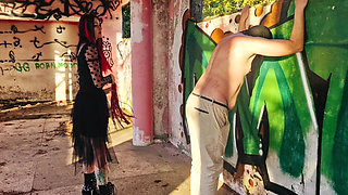 BDSM femdom flogging. Dominatrix Nika punishes her slave at sunset in an abandoned building. Back scratching.