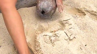 Masturbating on the Beach