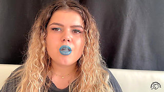 Exotic Goddess with Wild Hair Blows Smoke for You