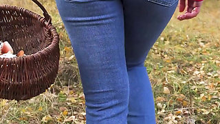 MILF In Blue Jeans Bends Over And Flashing Her Big Ass Outdoors