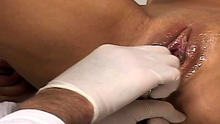 Gynecologist and his nurse checking teen slut's holes