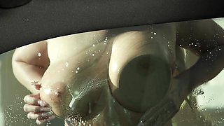 Two blondes, including hot Tiffani Madison, enjoy a steamy car ride.