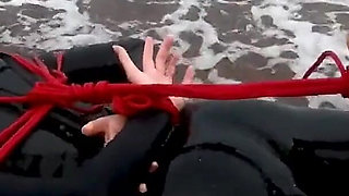 Hogtied in a Wetsuit - Rope Bondage Escape Challenge on the Beach