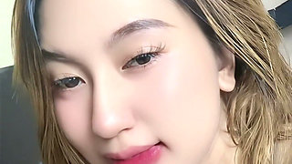 Blonde Asian Girl Masturbating with Milk