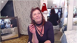 Curvy woman smoking at Christmas before grinding herself to climax