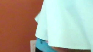 Nurse Vicki plays with a rubber ball in a mini skirt, sexy stockings and high heel mini boots