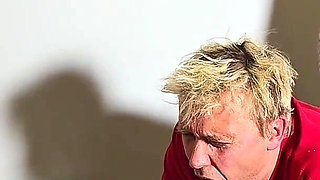 Femdom. He Smokes a Cigarette and a Busty Woman Fucks Him Hard in the Ass with a Strapon.