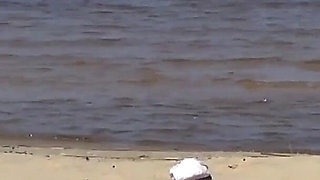 Nimble Mature Stepmommy Has Fun with Young Guys on the Beach 2