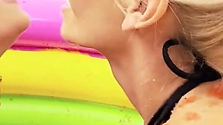 Lesb Pool_scene_2_lesbian MILF Couple in Bikinis Enjoy a Jelly Pool