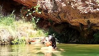 Wild girl posing naked and playing with herself outdoors