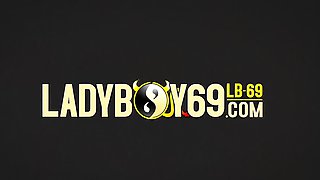 Brunette ladyboy in sandals teases with her shaved cock