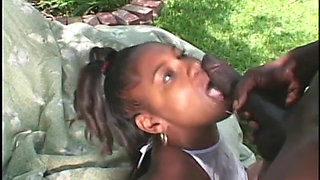 Pretty black babe takes cock inside her hairy cunt out in the bush