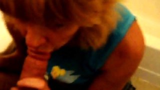 Blonde Granny Blowjob in a Bathroom