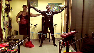 The Slave in Latex - Rough BDSM Action with Three People