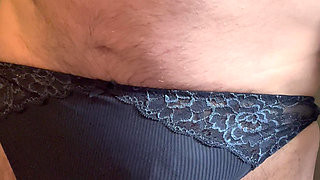 Feet rubbing cock in panties