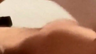 MILF in Pantyhose and Heels Gives a Footjob