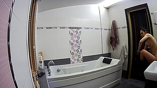 Stella Prepares to Take a Bath in the Bathroom - Real Amateur Voyeur Scene