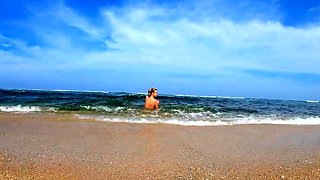 Blonde Babe's Naked Swim in the Ocean