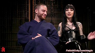 Vicious tattooed femdom torments bound man