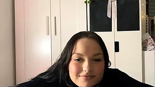 Girlfriend Gets Dressed Up and Sucks Huge Dildo Teasingly