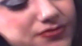 Latex Clad MILF Dominates Her Shackled Male Toy