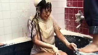 Asian girl gets a piss bukkake