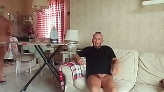 My stepmom is naked ironing laundry, and I watch a movie and jerk off to her.
