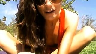 Small titted brunette Sharron with glasses masturbates