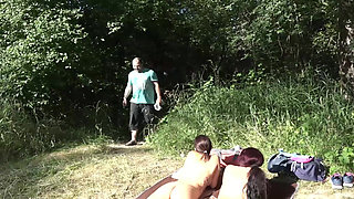 Sexy French sluts sharing big dick by the river