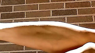 Small Asian Feet in Red Heeled Flip Flops