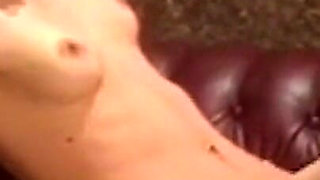 Seductive Brunette Gets Fingered and Fucked on the Couch