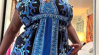 Chubby Ebony in Dress Showing Her Big Tits & Ass