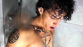 Tattooed Latino Boy Gets Passionate Handjob in Wet Shower