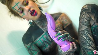Strongly tattooed model intense ass-fuck jerking off in the shower