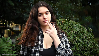 Sweet and Busty Russian Babe Smoking Cigarette in Nature